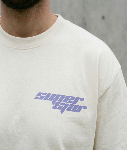 Ivory t-shirt with 'Superstar' text in purple on a left side of chest