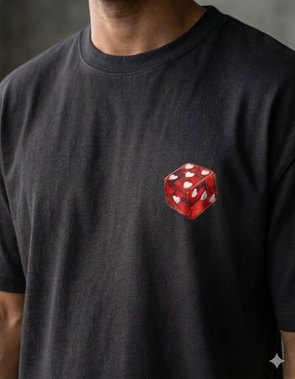 Person wearing a black t-shirt with a red die graphic on the chest.