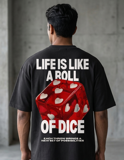 Person wearing a black t-shirt with a dice graphic and text on the back.