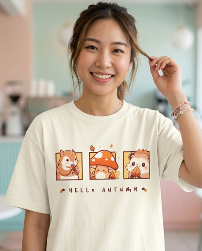 Women wearing a Ivory t-shirt with autumn-themed graphics and text.